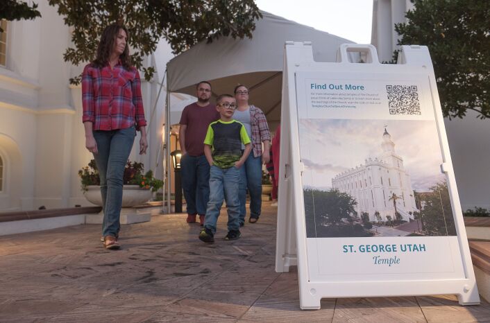 From left, Michelle Usselman, Mike Fjeld, Carson Fjeld and Teone Fjeld exit the St. George Utah Temple on the last day of the public open house.