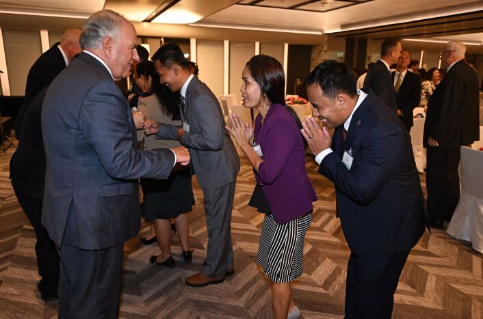 Elder Ronald A. Rasband greets local Church leaders from 11 Southeast Asia countries in Bangkok.